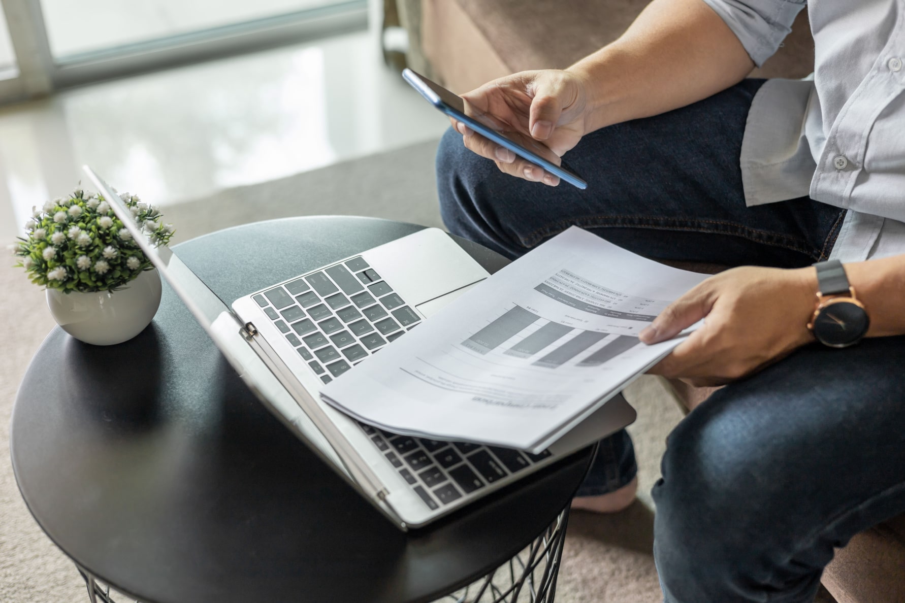 Man completing best tax efficient investing review on laptop